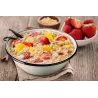 Rice porridge with strawberries, mango and vanilla