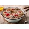 Rice porridge with raspberries, plums and cinnamon