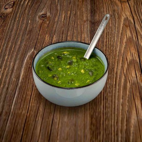 Cream of broccoli and spinach soup with mozzarella and pumpkin seeds